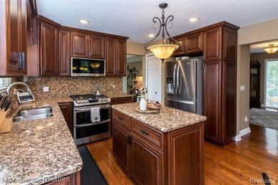 Meticulously maintained & tastefully updated 4 Bedroom / 2.5 on Beacon Hill Golf Club in Michigan - for sale on GolfHomes.com, golf home, golf lot