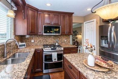 Meticulously maintained & tastefully updated 4 Bedroom / 2.5 on Beacon Hill Golf Club in Michigan - for sale on GolfHomes.com, golf home, golf lot