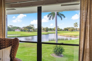 Enjoy gorgeous golf course and lake views from this stunning on Quail Ridge Golf Course and Country Club in Florida - for sale on GolfHomes.com, golf home, golf lot