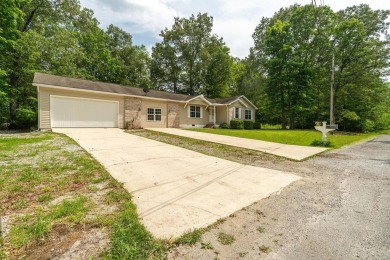 Move-in ready and full of charm, this delightful 3 bed, 2 bath on Lake Tansi Village Country Club in Tennessee - for sale on GolfHomes.com, golf home, golf lot