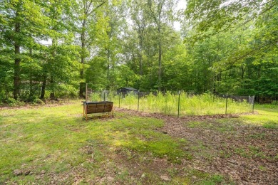 Move-in ready and full of charm, this delightful 3 bed, 2 bath on Lake Tansi Village Country Club in Tennessee - for sale on GolfHomes.com, golf home, golf lot
