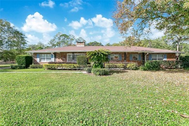 Experience an extraordinary confluence of generous space on Rio Pinar Golf and Country Club in Florida - for sale on GolfHomes.com, golf home, golf lot