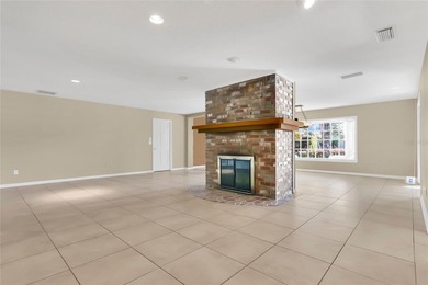 Experience an extraordinary confluence of generous space on Rio Pinar Golf and Country Club in Florida - for sale on GolfHomes.com, golf home, golf lot