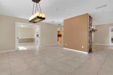 Experience an extraordinary confluence of generous space on Rio Pinar Golf and Country Club in Florida - for sale on GolfHomes.com, golf home, golf lot