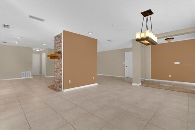 Experience an extraordinary confluence of generous space on Rio Pinar Golf and Country Club in Florida - for sale on GolfHomes.com, golf home, golf lot