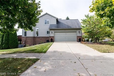 Meticulously maintained & tastefully updated 4 Bedroom / 2.5 on Beacon Hill Golf Club in Michigan - for sale on GolfHomes.com, golf home, golf lot
