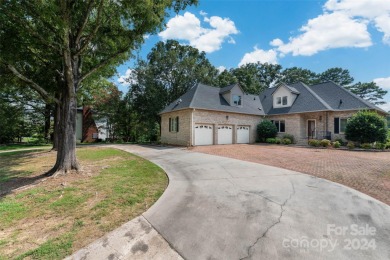 Beautiful all brick home on a spacious .56-acre lot, overlooking on Corbin Hills Golf Club in North Carolina - for sale on GolfHomes.com, golf home, golf lot