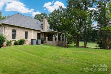 Beautiful all brick home on a spacious .56-acre lot, overlooking on Corbin Hills Golf Club in North Carolina - for sale on GolfHomes.com, golf home, golf lot