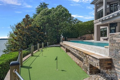 You will be In AWE at this WATERFRONT ESTATE w/mile-long views! on The Peninsula Club in North Carolina - for sale on GolfHomes.com, golf home, golf lot