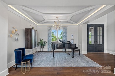 You will be In AWE at this WATERFRONT ESTATE w/mile-long views! on The Peninsula Club in North Carolina - for sale on GolfHomes.com, golf home, golf lot