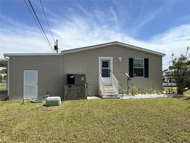 Beautiful 2011 Palm Harbor Manufactured Home, 1,404 SqFt 2 on Mangrove Bay Golf Course in Florida - for sale on GolfHomes.com, golf home, golf lot