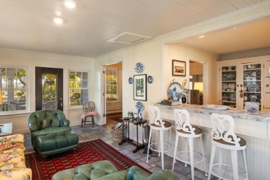 Built on a spacious scenic lot on the north side of Downtown on Charlevoix Golf Club in Michigan - for sale on GolfHomes.com, golf home, golf lot