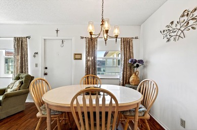 Welcome to effortless Florida living in this beautifully on The American Golf Club in Florida - for sale on GolfHomes.com, golf home, golf lot