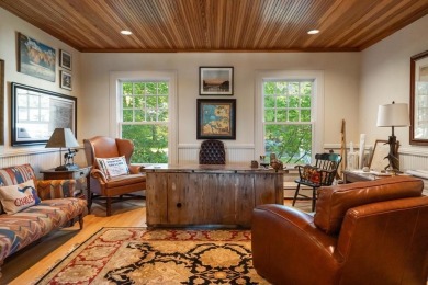 Built on a spacious scenic lot on the north side of Downtown on Charlevoix Golf Club in Michigan - for sale on GolfHomes.com, golf home, golf lot