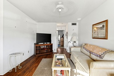 Welcome to effortless Florida living in this beautifully on The American Golf Club in Florida - for sale on GolfHomes.com, golf home, golf lot