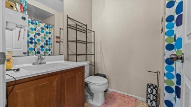 Welcome to this spacious 5 bedroom, 3 bath home nestled in the on  in California - for sale on GolfHomes.com, golf home, golf lot