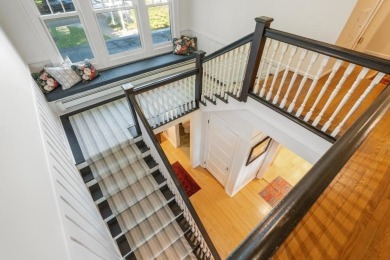 Built on a spacious scenic lot on the north side of Downtown on Charlevoix Golf Club in Michigan - for sale on GolfHomes.com, golf home, golf lot