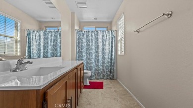 Welcome to this spacious 5 bedroom, 3 bath home nestled in the on  in California - for sale on GolfHomes.com, golf home, golf lot