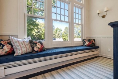 Built on a spacious scenic lot on the north side of Downtown on Charlevoix Golf Club in Michigan - for sale on GolfHomes.com, golf home, golf lot