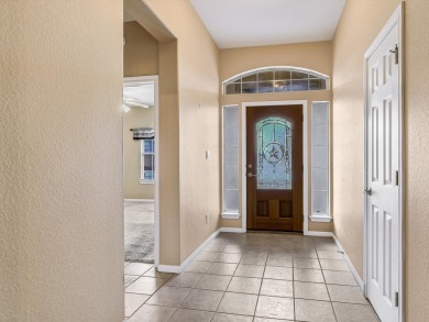 This warm, open floor plan lives large with rooms overlooking on Delaware Springs Golf Course in Texas - for sale on GolfHomes.com, golf home, golf lot