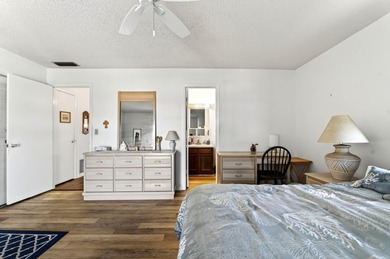 Welcome to effortless Florida living in this beautifully on The American Golf Club in Florida - for sale on GolfHomes.com, golf home, golf lot