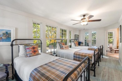 Built on a spacious scenic lot on the north side of Downtown on Charlevoix Golf Club in Michigan - for sale on GolfHomes.com, golf home, golf lot