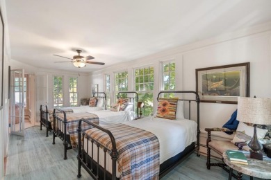 Built on a spacious scenic lot on the north side of Downtown on Charlevoix Golf Club in Michigan - for sale on GolfHomes.com, golf home, golf lot