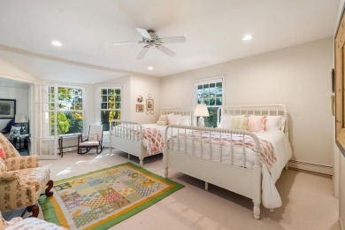 Built on a spacious scenic lot on the north side of Downtown on Charlevoix Golf Club in Michigan - for sale on GolfHomes.com, golf home, golf lot