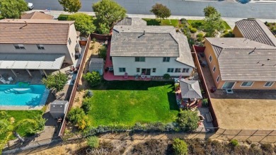 Welcome to this spacious 5 bedroom, 3 bath home nestled in the on  in California - for sale on GolfHomes.com, golf home, golf lot