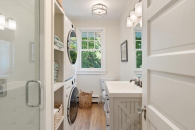 Built on a spacious scenic lot on the north side of Downtown on Charlevoix Golf Club in Michigan - for sale on GolfHomes.com, golf home, golf lot
