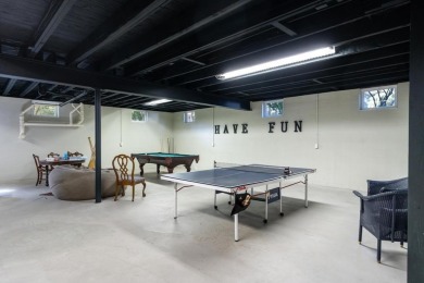 Built on a spacious scenic lot on the north side of Downtown on Charlevoix Golf Club in Michigan - for sale on GolfHomes.com, golf home, golf lot