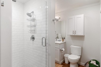 Built on a spacious scenic lot on the north side of Downtown on Charlevoix Golf Club in Michigan - for sale on GolfHomes.com, golf home, golf lot
