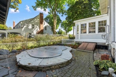 Built on a spacious scenic lot on the north side of Downtown on Charlevoix Golf Club in Michigan - for sale on GolfHomes.com, golf home, golf lot