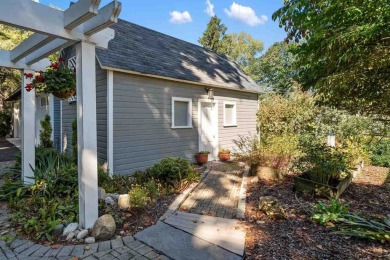 Built on a spacious scenic lot on the north side of Downtown on Charlevoix Golf Club in Michigan - for sale on GolfHomes.com, golf home, golf lot