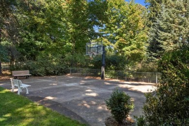 Built on a spacious scenic lot on the north side of Downtown on Charlevoix Golf Club in Michigan - for sale on GolfHomes.com, golf home, golf lot