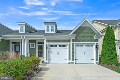 Beautiful Bayside Carriage home overlooking pond with screened on Bayside Resort Golf Club in Delaware - for sale on GolfHomes.com, golf home, golf lot