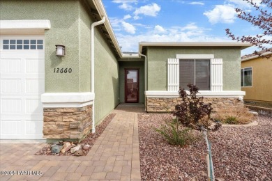 Experience golf course views in this updated three-bedroom on Quail Wood Greens Golf Course in Arizona - for sale on GolfHomes.com, golf home, golf lot