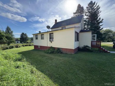 Welcome to this affordable 4-bedroom, 1-bath home situated on a on Crystal View Municipal Golf Course in Michigan - for sale on GolfHomes.com, golf home, golf lot