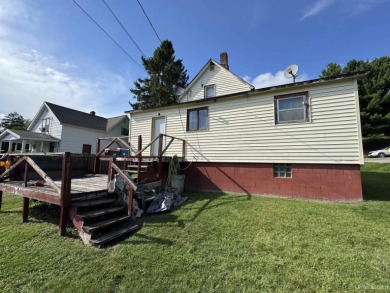 Welcome to this affordable 4-bedroom, 1-bath home situated on a on Crystal View Municipal Golf Course in Michigan - for sale on GolfHomes.com, golf home, golf lot
