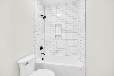 Discover the epitome of lakeside living at 301 Portland Circle on The Links At Stoney Point in South Carolina - for sale on GolfHomes.com, golf home, golf lot