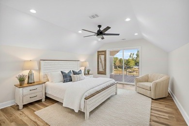 Discover the epitome of lakeside living at 301 Portland Circle on The Links At Stoney Point in South Carolina - for sale on GolfHomes.com, golf home, golf lot