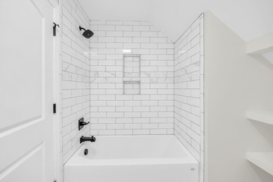 Discover the epitome of lakeside living at 301 Portland Circle on The Links At Stoney Point in South Carolina - for sale on GolfHomes.com, golf home, golf lot