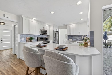 Nestled in the desirable Tanglewood neighborhood, this on Mangrove Bay Golf Course in Florida - for sale on GolfHomes.com, golf home, golf lot