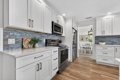 Nestled in the desirable Tanglewood neighborhood, this on Mangrove Bay Golf Course in Florida - for sale on GolfHomes.com, golf home, golf lot