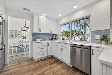 Nestled in the desirable Tanglewood neighborhood, this on Mangrove Bay Golf Course in Florida - for sale on GolfHomes.com, golf home, golf lot