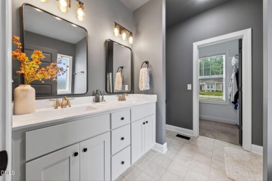 This better than new custom built 2021 home offers an open floor on River Golf and Country Club at Lake Royale in North Carolina - for sale on GolfHomes.com, golf home, golf lot