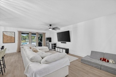 Spacious almost 2200 sq ft 3 bedroom 2.5 bath lakefront town on Jacaranda Golf Club in Florida - for sale on GolfHomes.com, golf home, golf lot