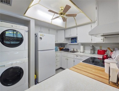 Charming 2nd Floor Furnished Condo in Live Oak Village - 55+ on Country Club At Silver Springs Shores in Florida - for sale on GolfHomes.com, golf home, golf lot
