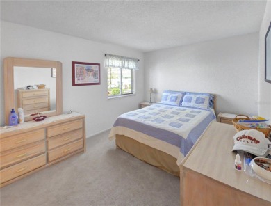 Charming 2nd Floor Furnished Condo in Live Oak Village - 55+ on Country Club At Silver Springs Shores in Florida - for sale on GolfHomes.com, golf home, golf lot