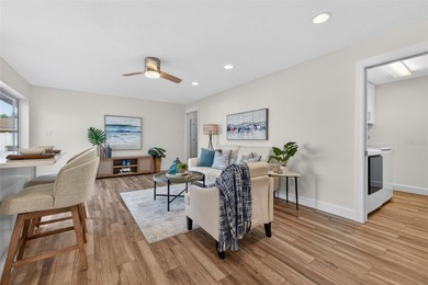 Nestled in the desirable Tanglewood neighborhood, this on Mangrove Bay Golf Course in Florida - for sale on GolfHomes.com, golf home, golf lot